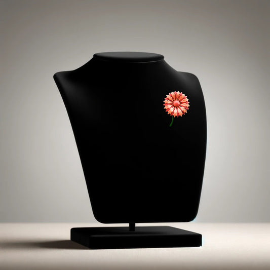 Pink flower brooch with moveable stem on neutral background, vintage home decor or collectible.