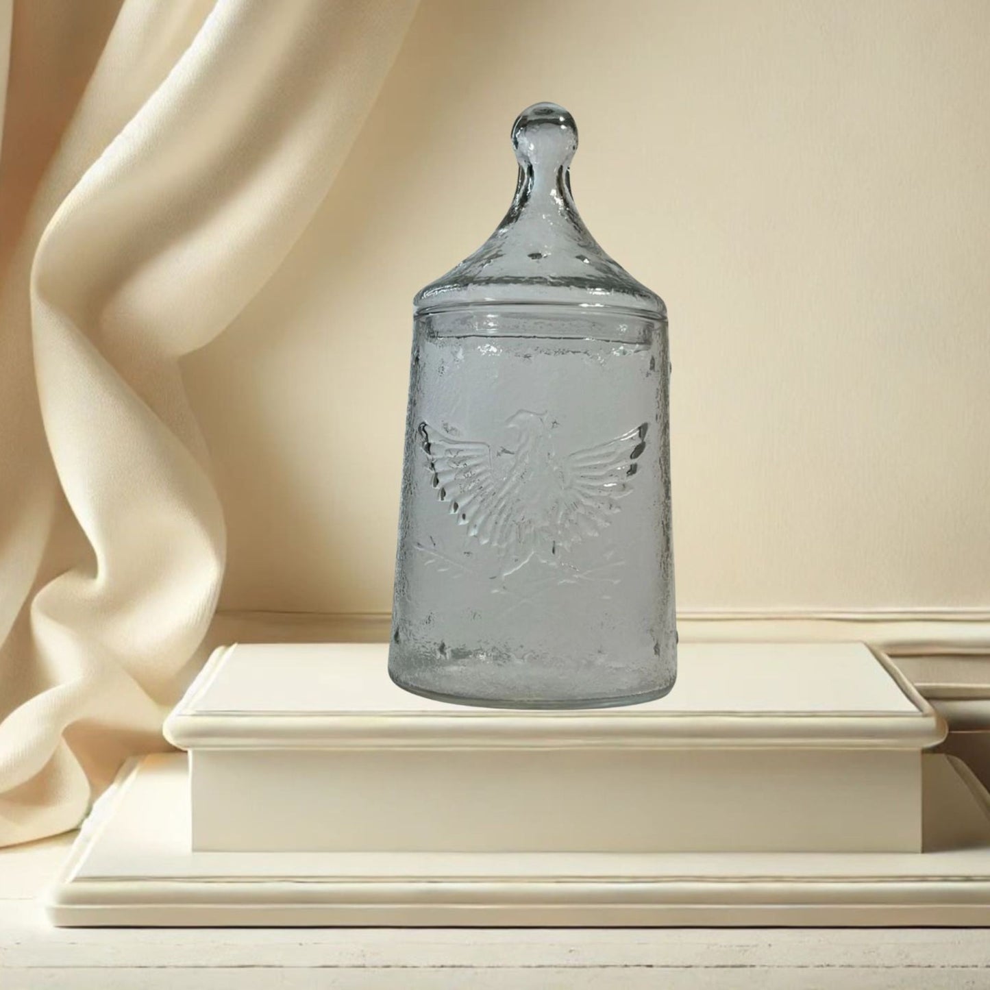 Apocathary jar with eagle and stars on neutral background, vintage home decor or collectible.