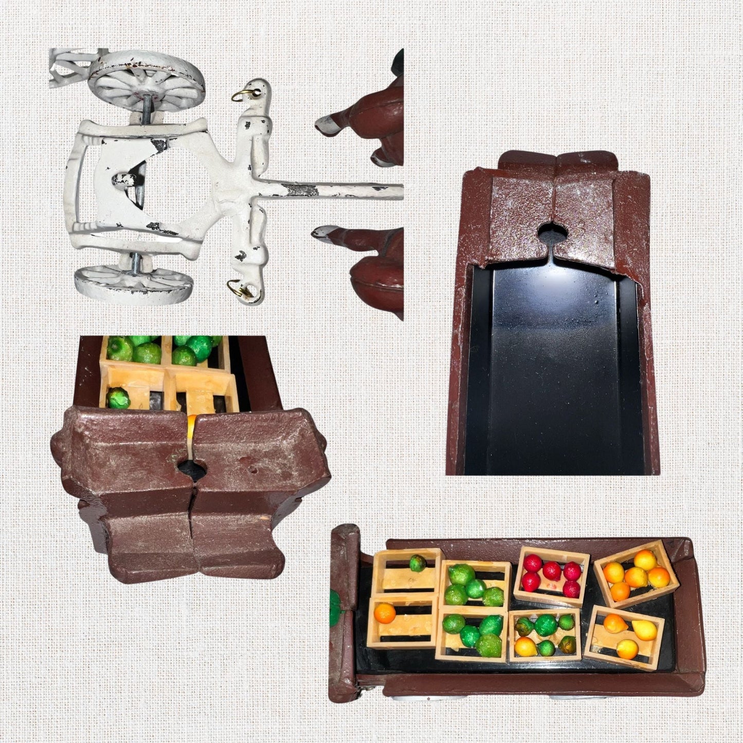 Cast iron horse drawn produce wagon on neutral background, vintage home decor or collectible.