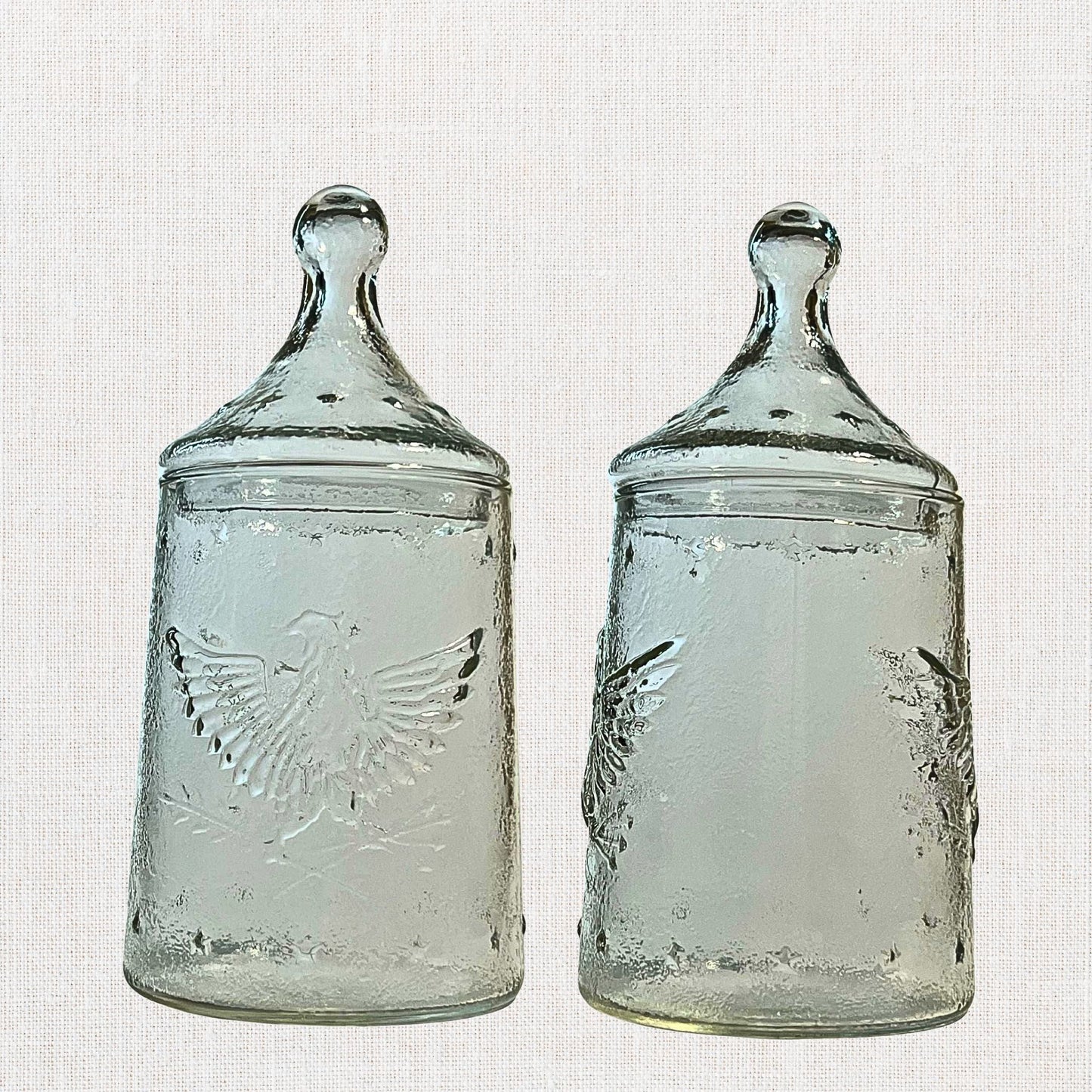 Apocathary jar with eagle and stars on neutral background, vintage home decor or collectible.