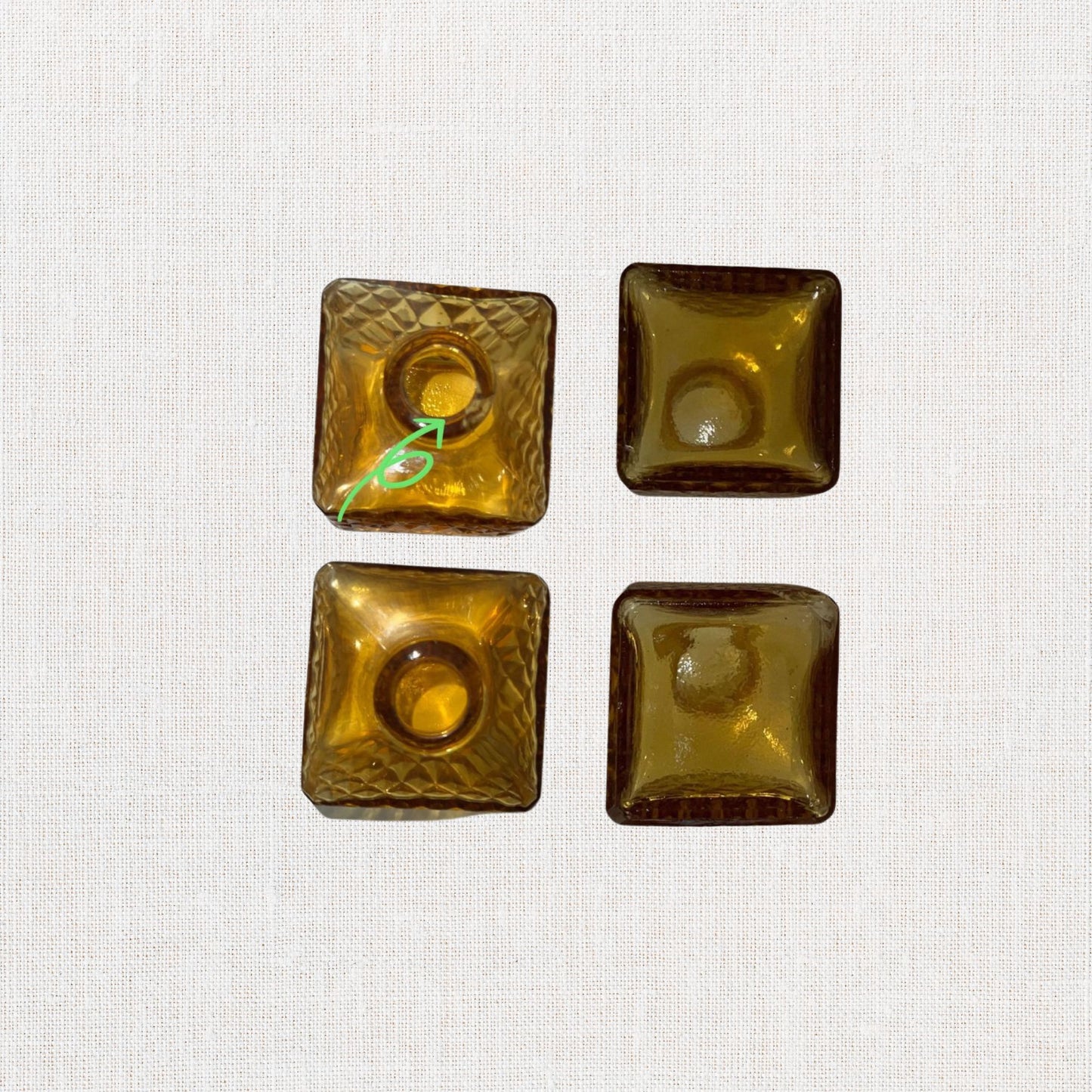 Amber diamond cut square decanter set on neutral background, vintage home decor or collectible.
