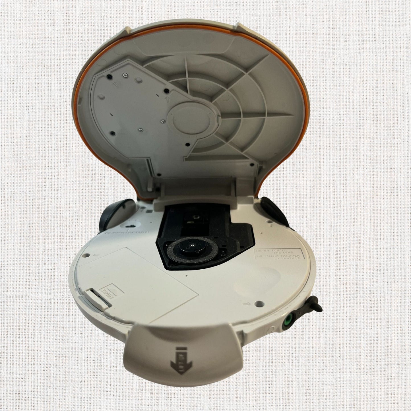 Sony discman model d-sj301 working on neutral background, vintage home decor or collectible.