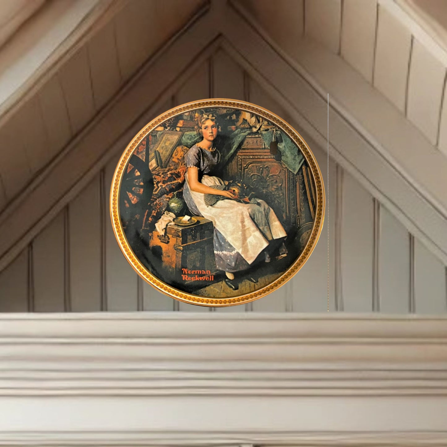 Norman rockwell dreaming in the attic plate on neutral background, vintage home decor or collectible.