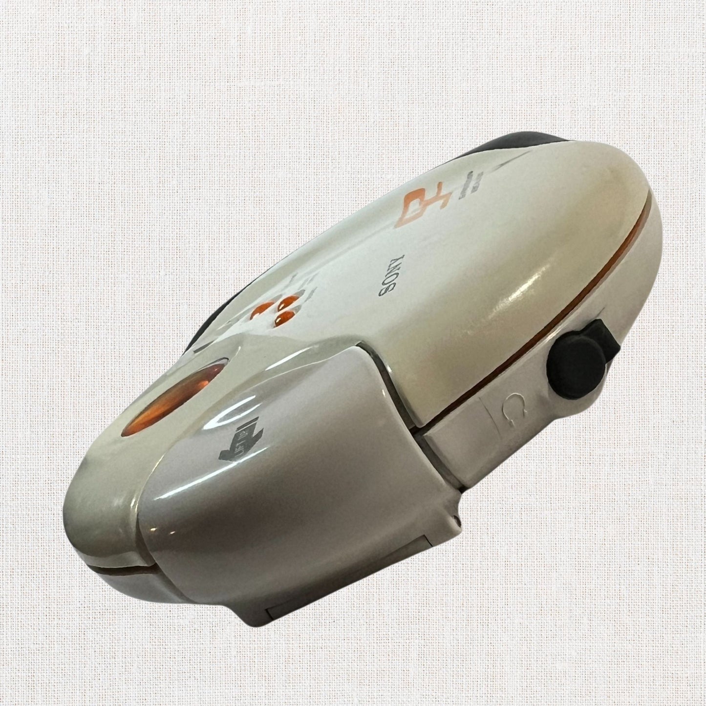 Sony discman model d-sj301 working on neutral background, vintage home decor or collectible.