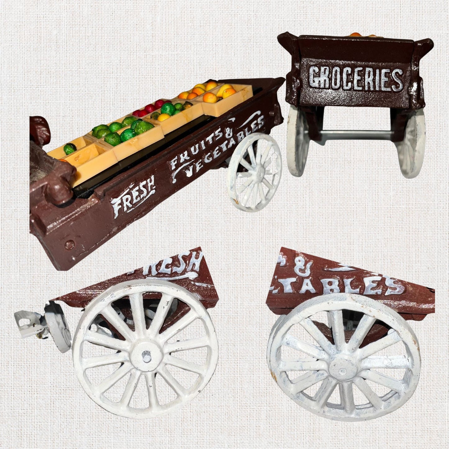 Cast iron horse drawn produce wagon on neutral background, vintage home decor or collectible.