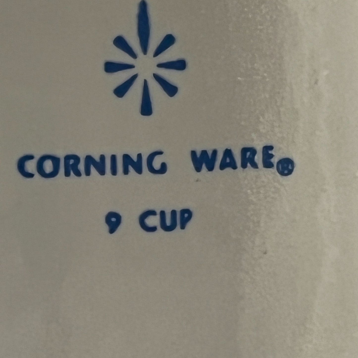 Corningware blue cornflower coffee pot on neutral background, vintage home decor or collectible.