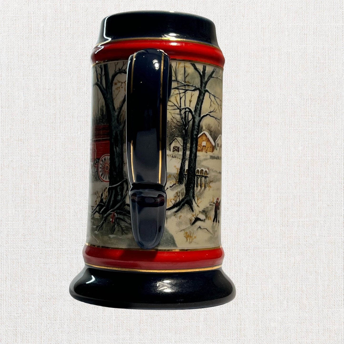 Budweiser 1990 collectible beer stein – winter village design, on neutral background, vintage home decor or collectible.