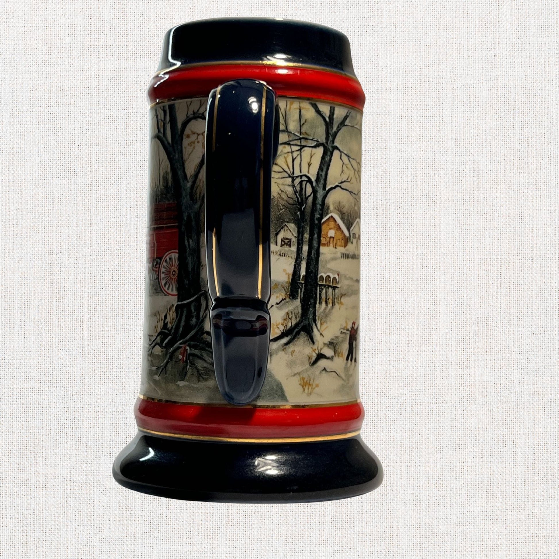 Budweiser 1990 collectible beer stein – winter village design, on neutral background, vintage home decor or collectible.