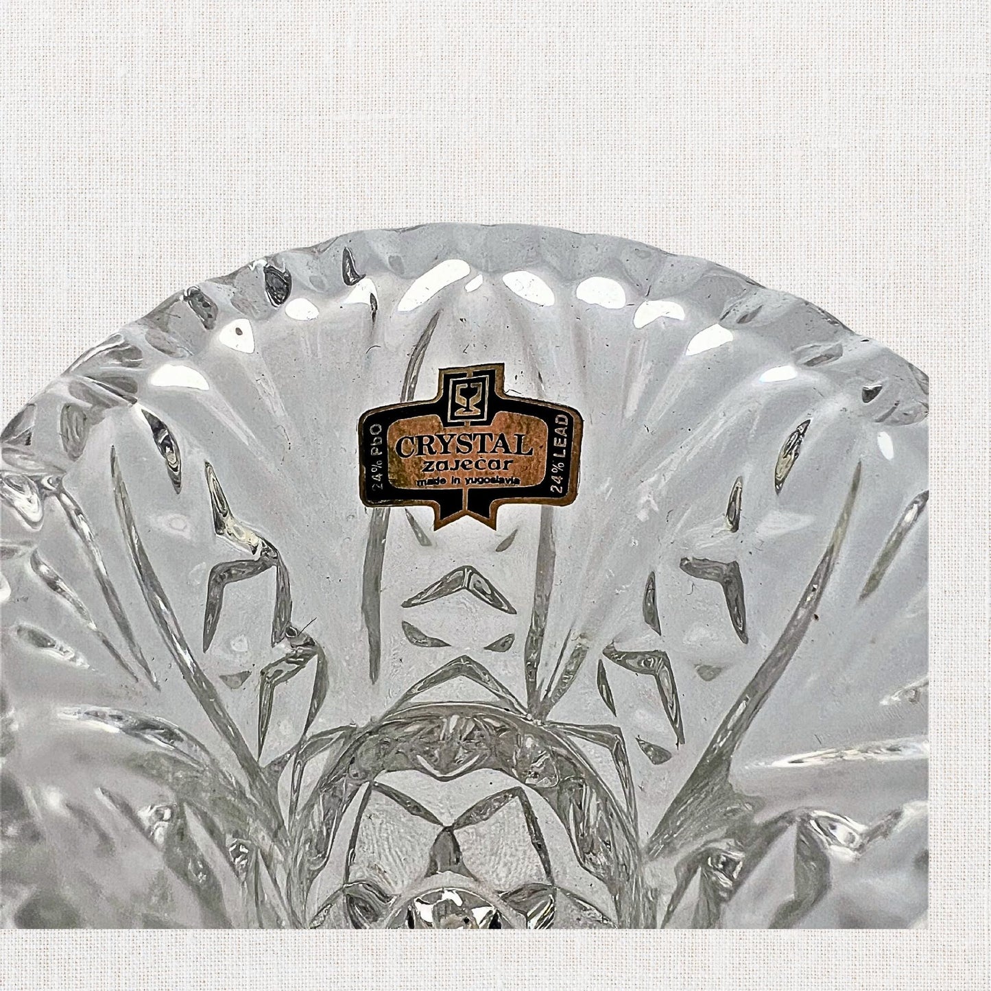 Lead-crystal D’Ariana bud vase (Yugoslavia, 1980s) in box.