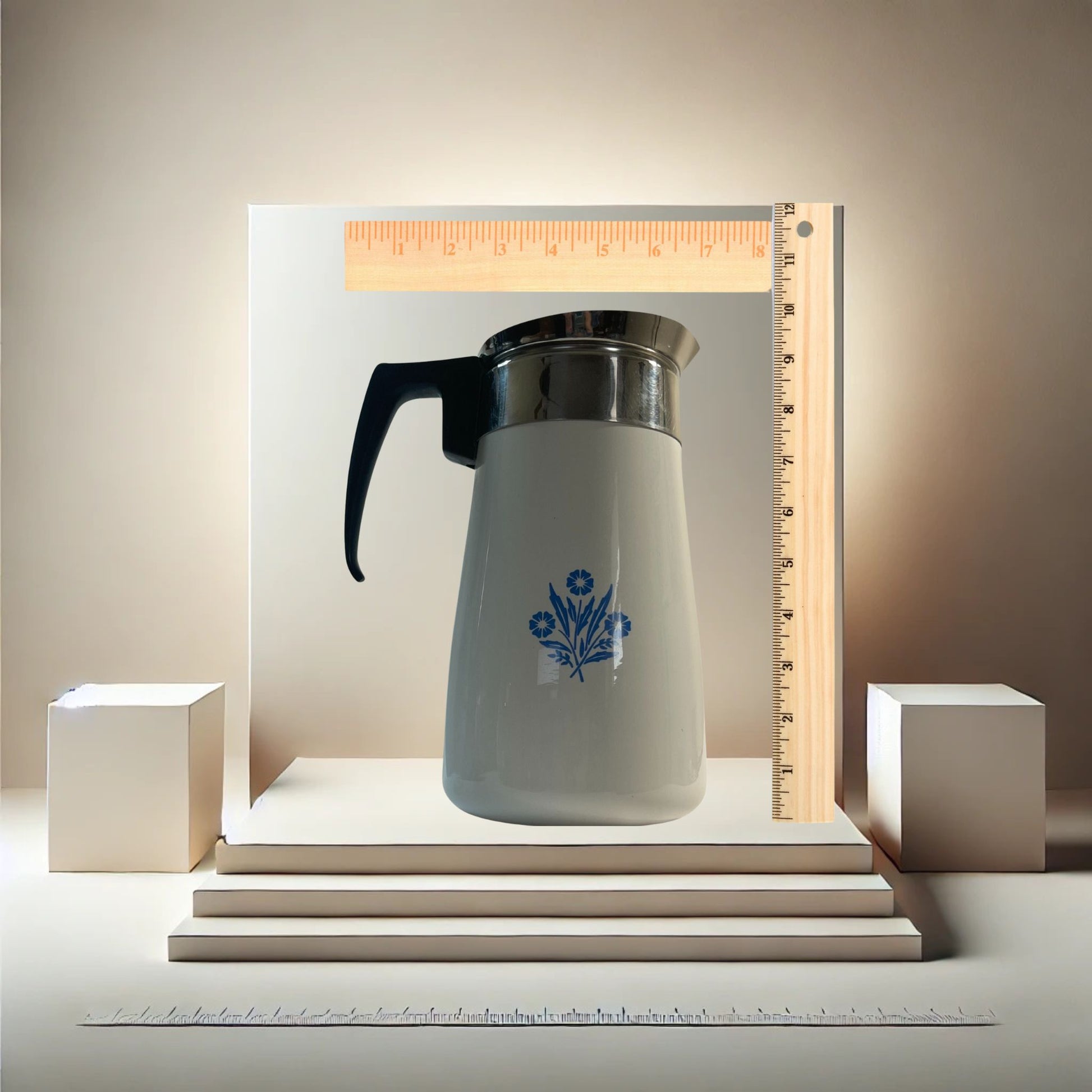 Corningware blue cornflower coffee pot on neutral background, vintage home decor or collectible.