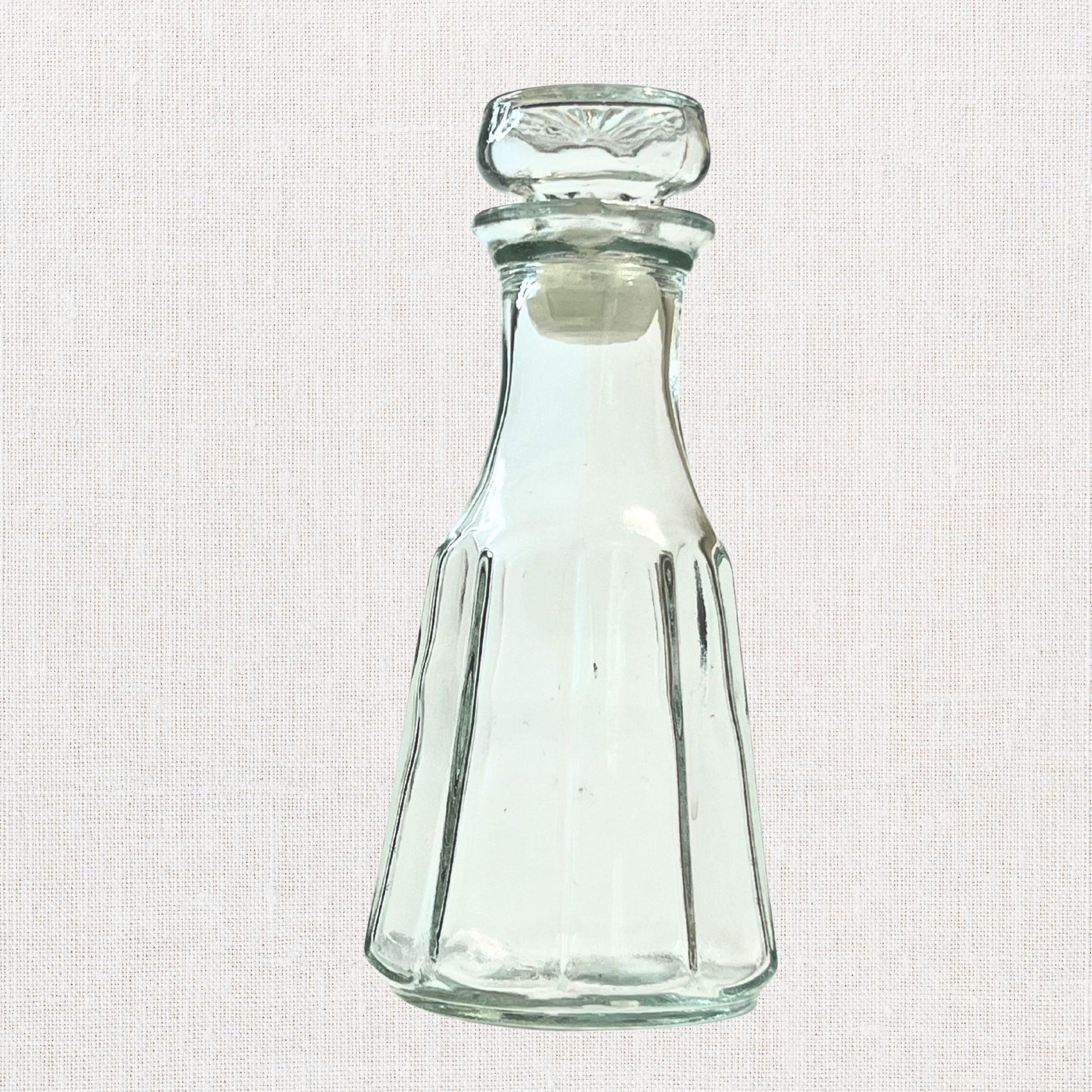 Good seasons clear octagon shaped cruet on neutral background, vintage home decor or collectible.