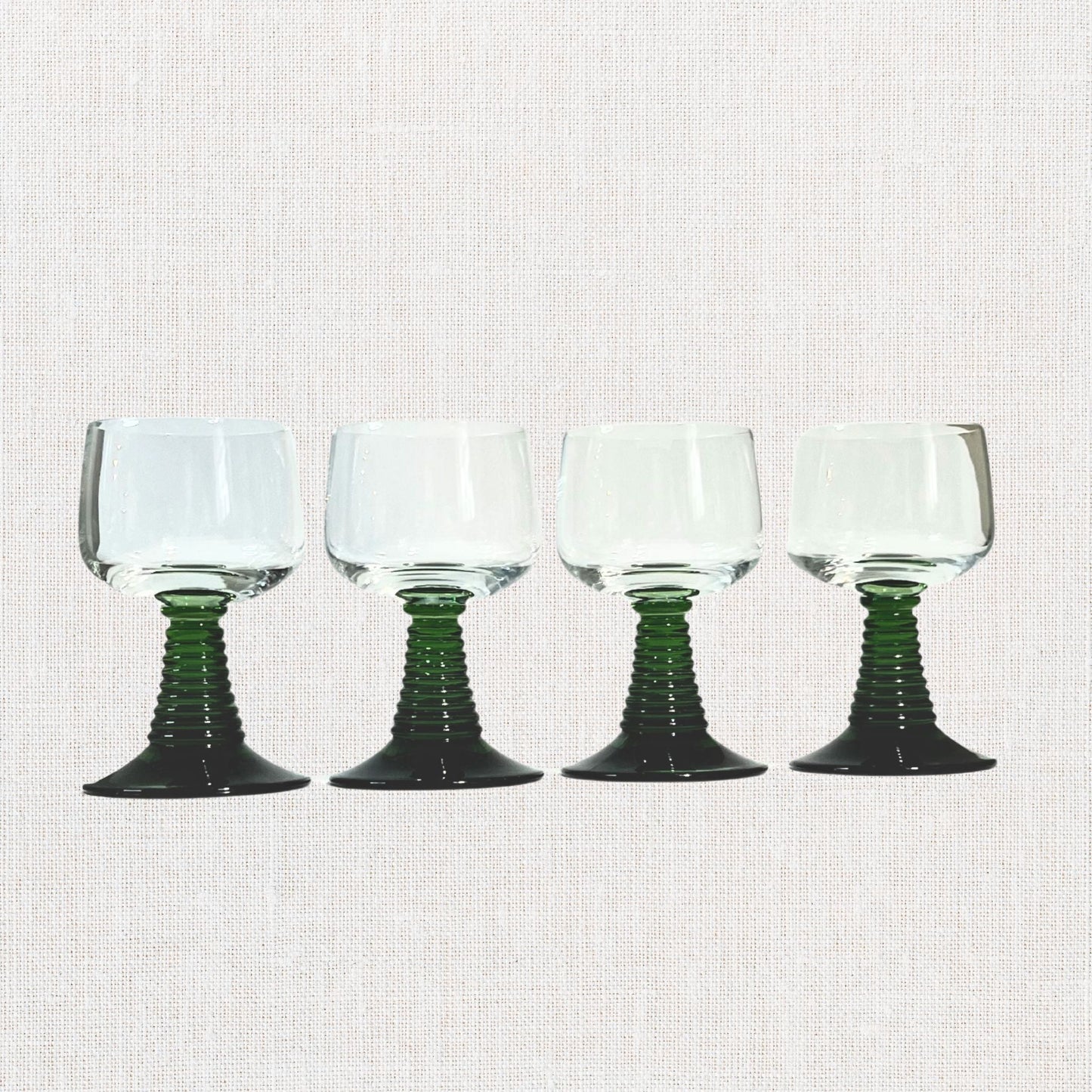 Luminarc green beehive stem cordial glasses on neutral background, vintage home decor or collectible.
