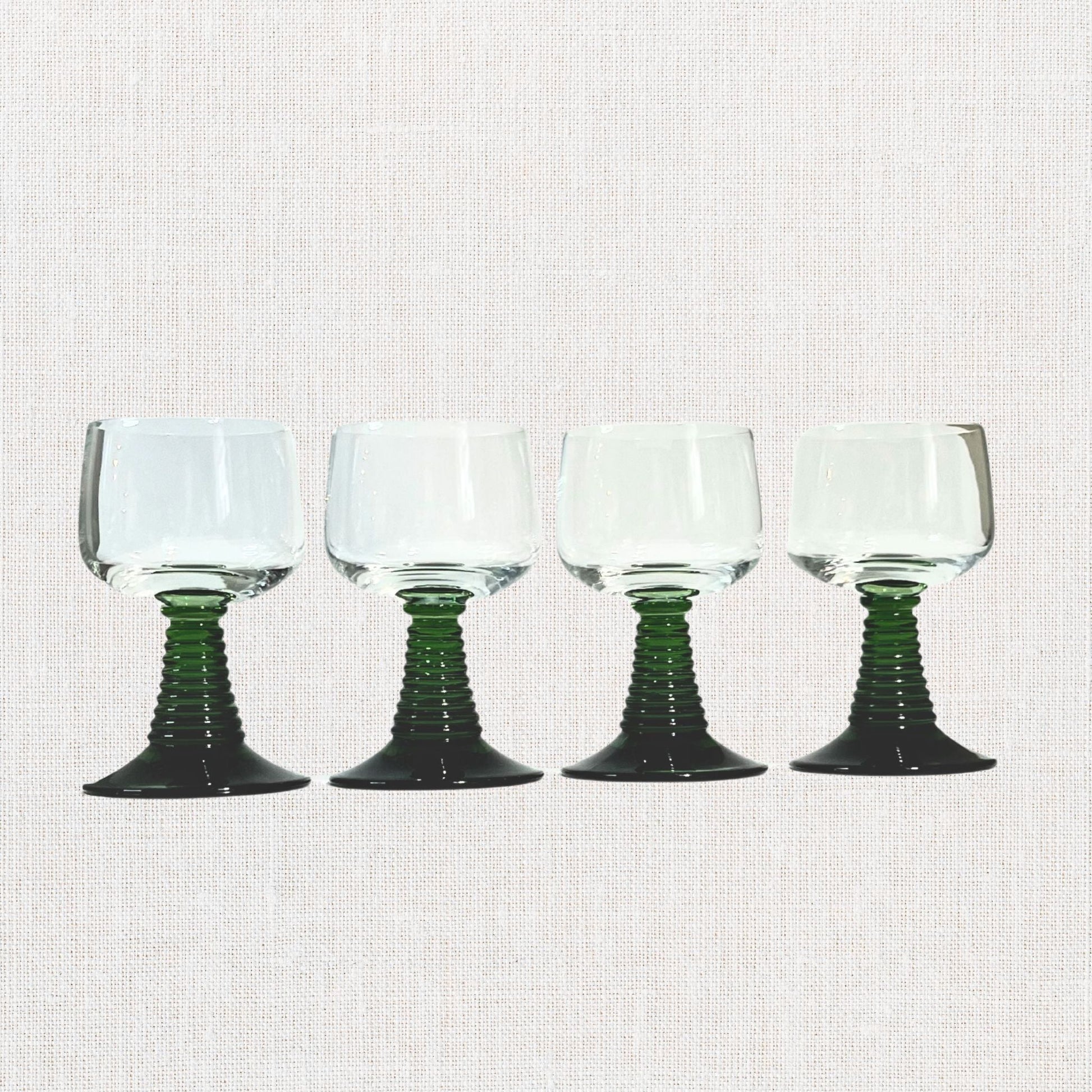 Luminarc green beehive stem cordial glasses on neutral background, vintage home decor or collectible.