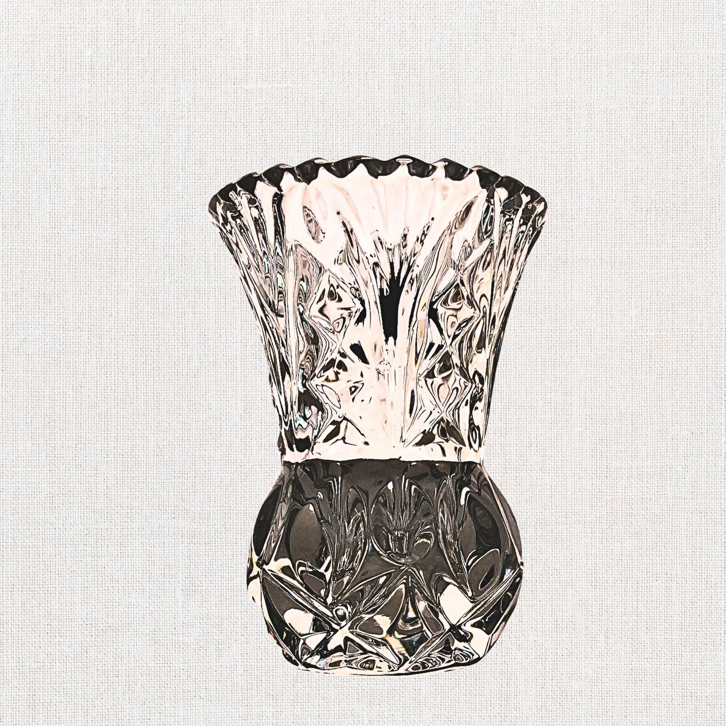 Lead-crystal D’Ariana bud vase (Yugoslavia, 1980s) in box.