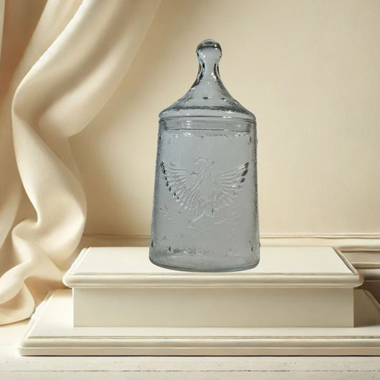Apocathary jar with eagle and stars on neutral background, vintage home decor or collectible.
