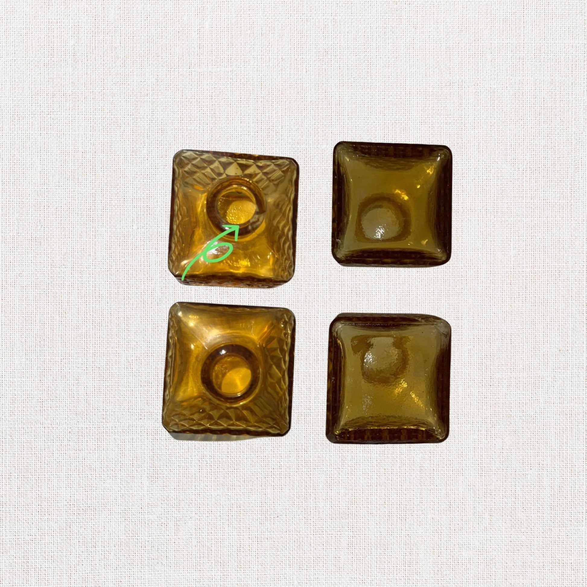 Amber diamond cut square decanter set on neutral background, vintage home decor or collectible.