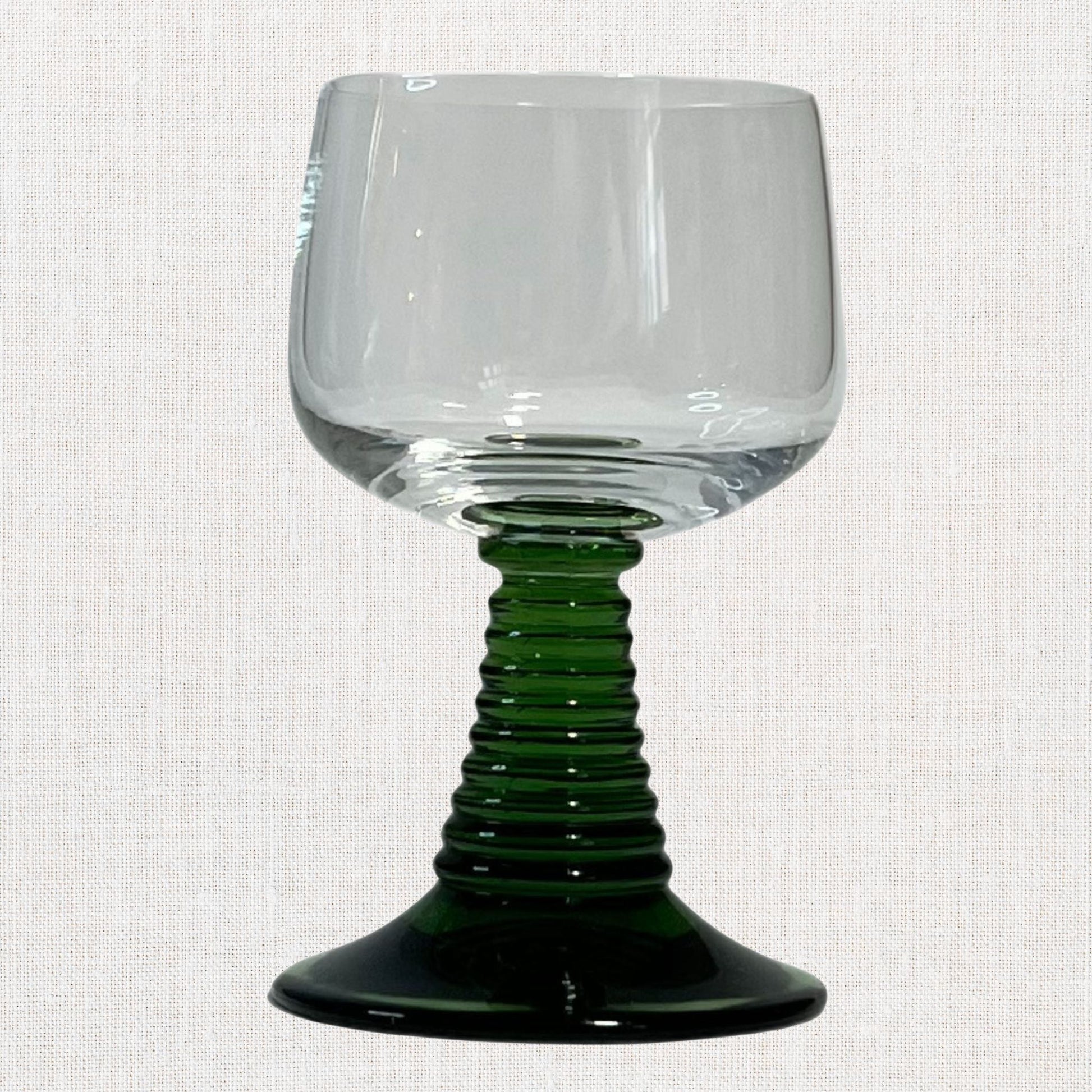 Luminarc green beehive stem cordial glasses on neutral background, vintage home decor or collectible.