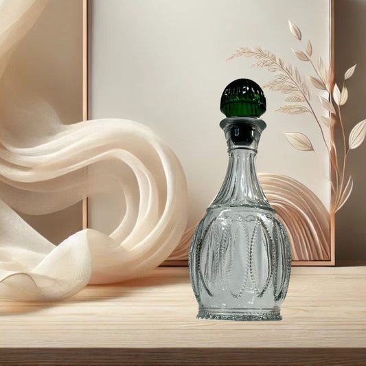 Avon “Jeannie Bottle” Decanter – Clear Pressed Glass with Emerald Stopper