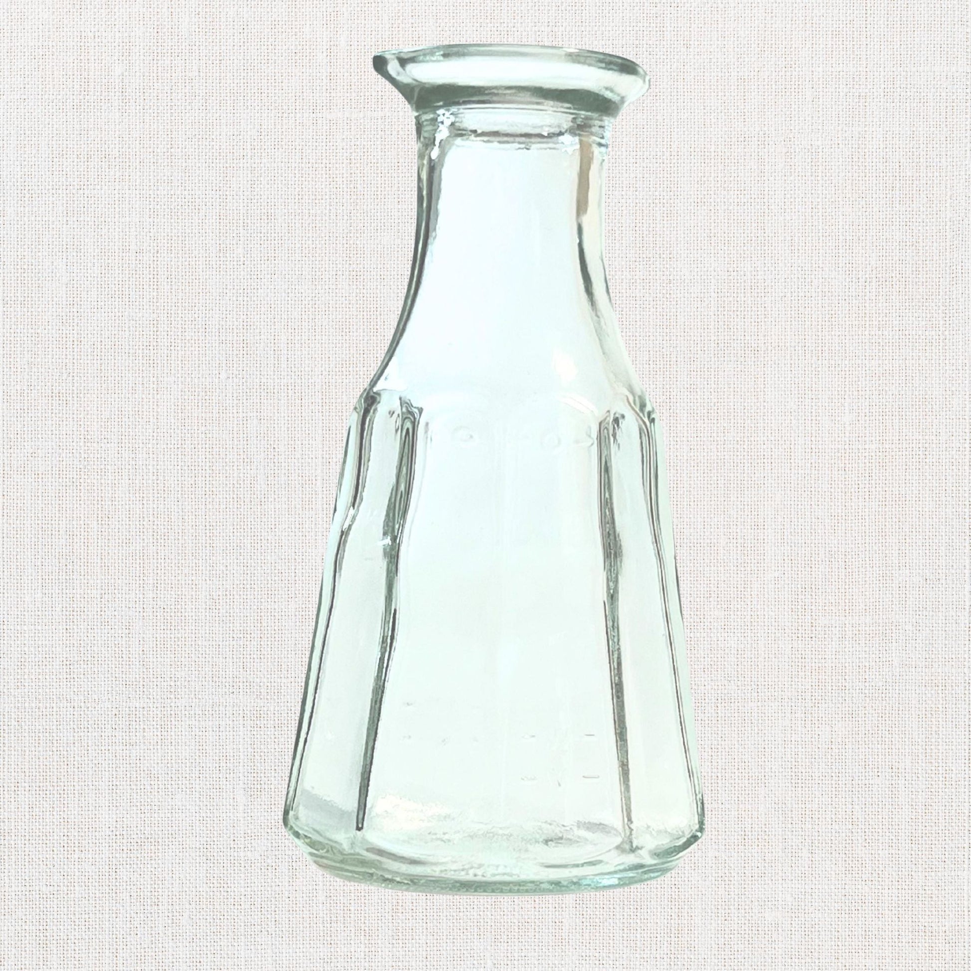 Good seasons clear octagon shaped cruet on neutral background, vintage home decor or collectible.