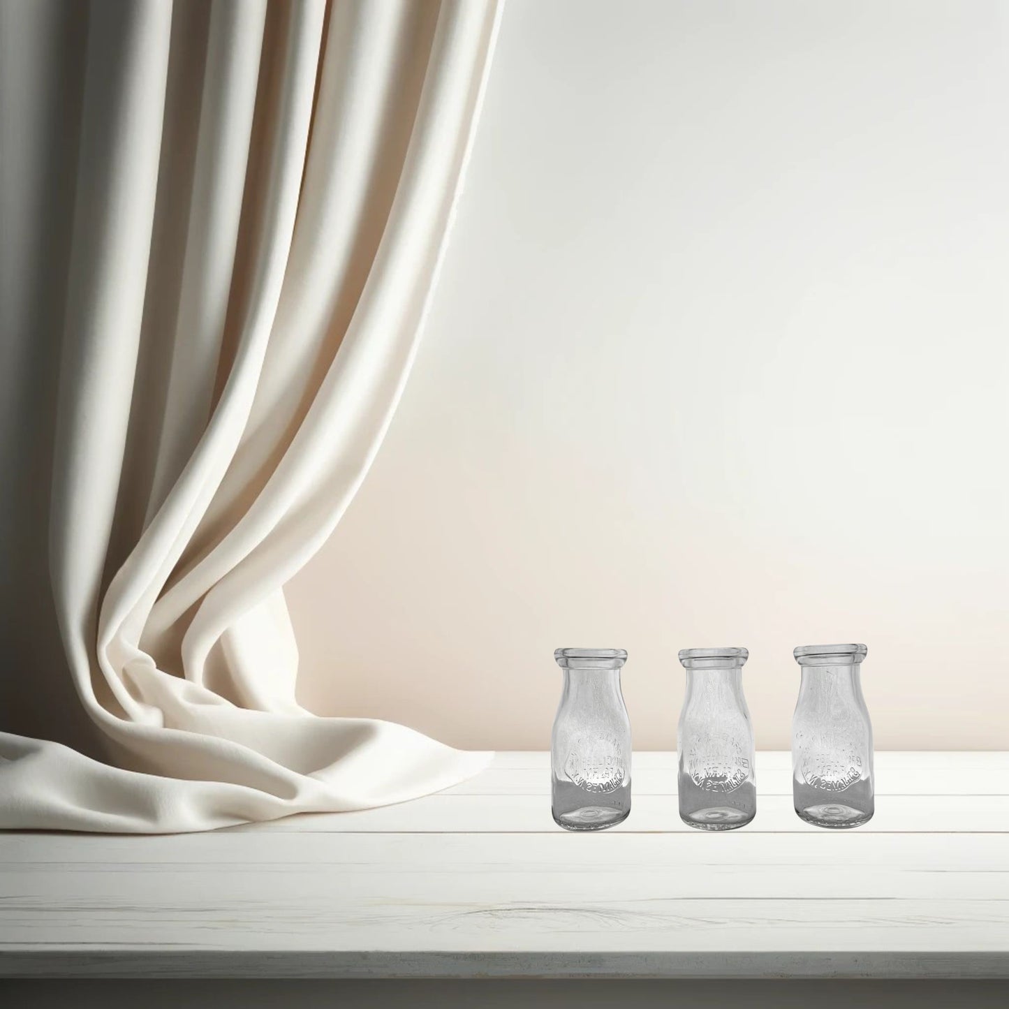 Branglebrink embossed cream bottles on neutral background, vintage home decor or collectible.