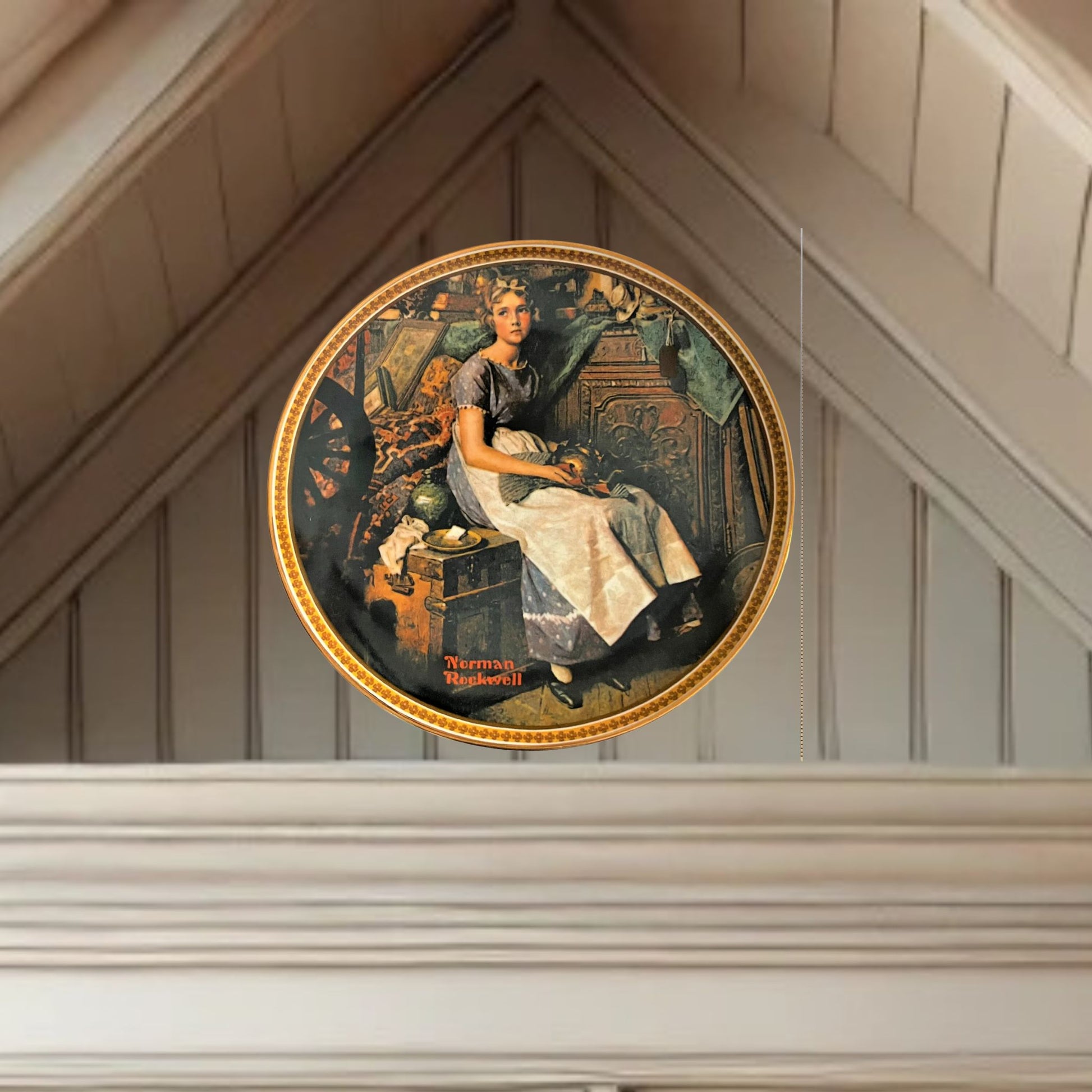 Norman rockwell dreaming in the attic plate on neutral background, vintage home decor or collectible.
