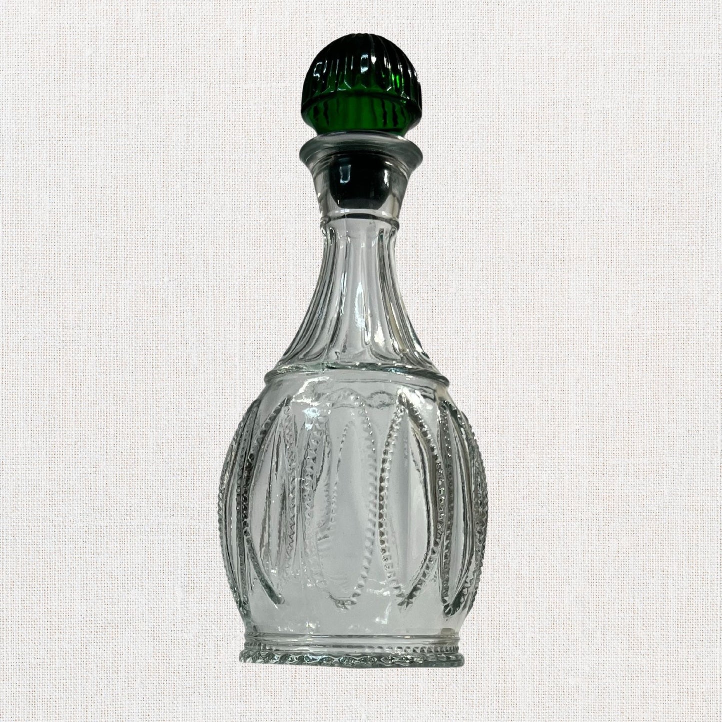 Avon “Jeannie Bottle” Decanter – Clear Pressed Glass with Emerald Stopper