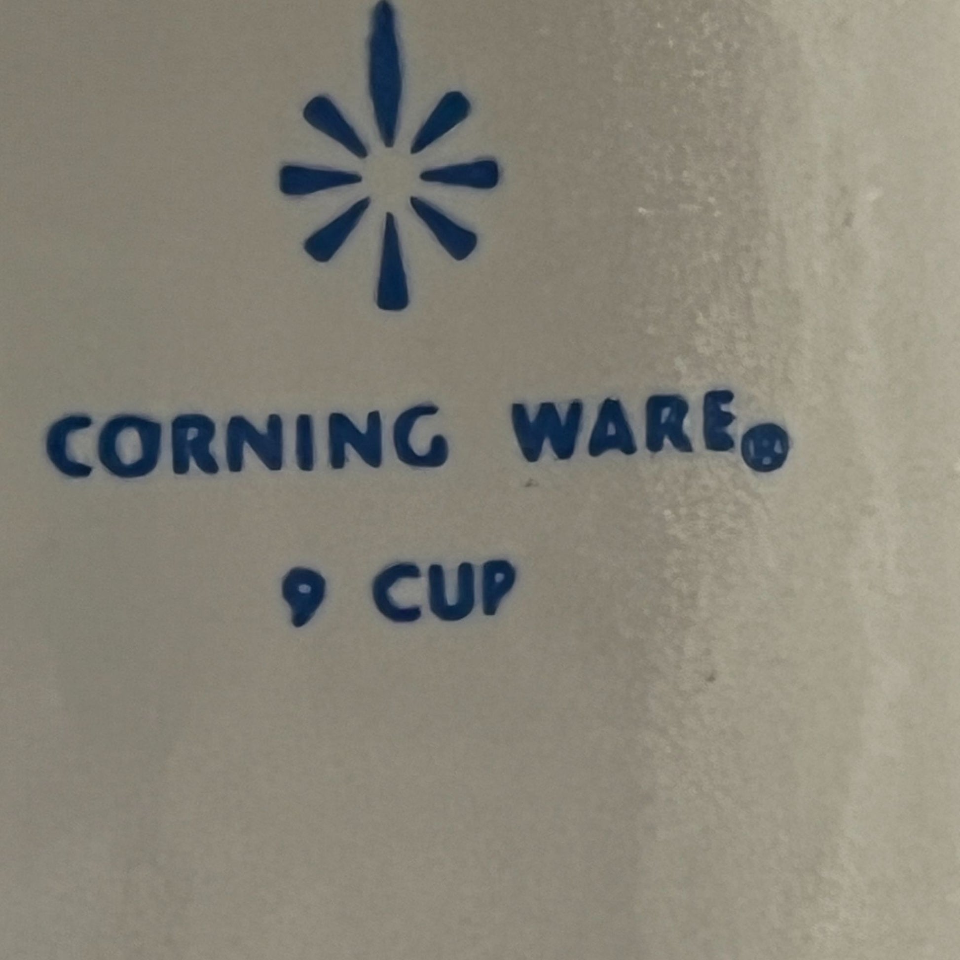 Corningware blue cornflower coffee pot on neutral background, vintage home decor or collectible.